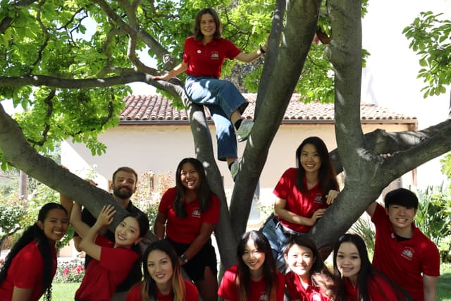 Team photo showcasing leadership and collaboration skills